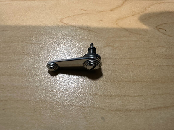 Cleaning & lubricating a GOMZ Leningrad, Remove the self timer lever: crwdns2935265:05crwdnd2935265:02crwdnd2935265:02crwdne2935265:0