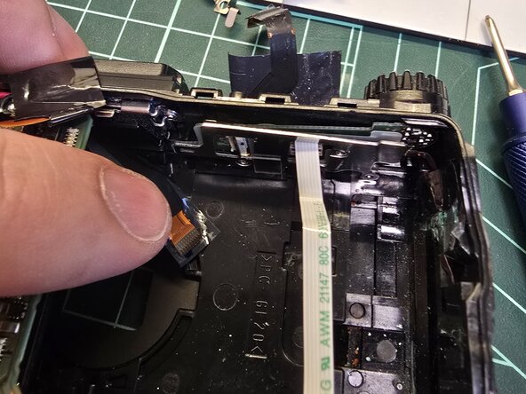 Disassembling Olympus TG-6, Shutter controls: step 11, image 1 of 2
