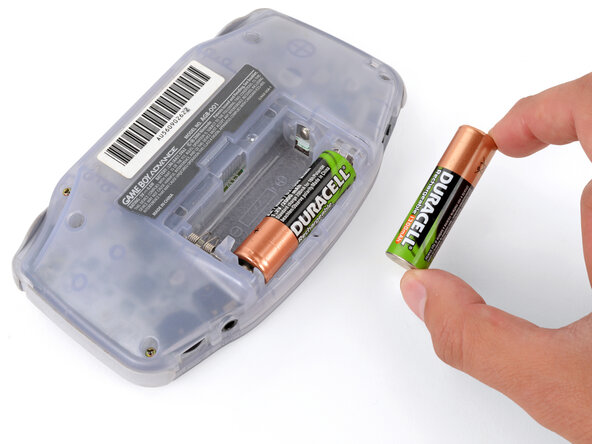 How to Reshell Your Game Boy Advance, Remove the batteries: crwdns2935265:03crwdnd2935265:02crwdnd2935265:03crwdne2935265:0