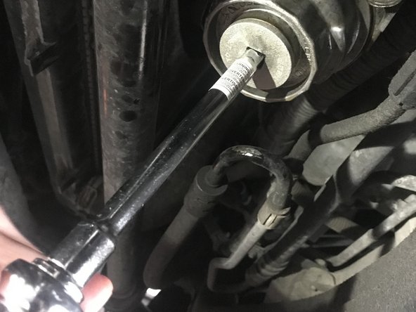 Reinstall oil filter cap. Tighten until snug, do not over tighten