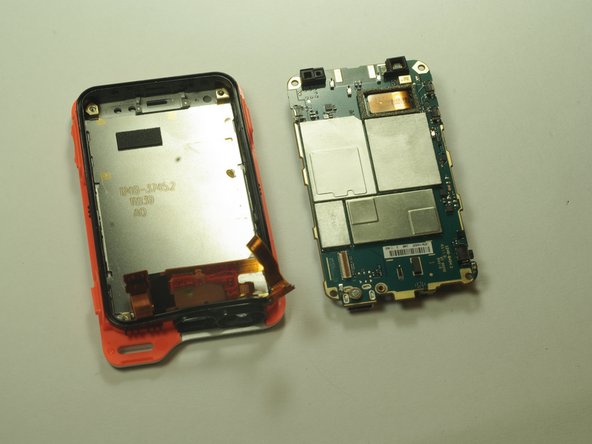 Sony Ericsson xPeria Active Camera Replacement, Remove the display ribbon cable: crwdns2935265:08crwdnd2935265:02crwdnd2935265:02crwdne2935265:0