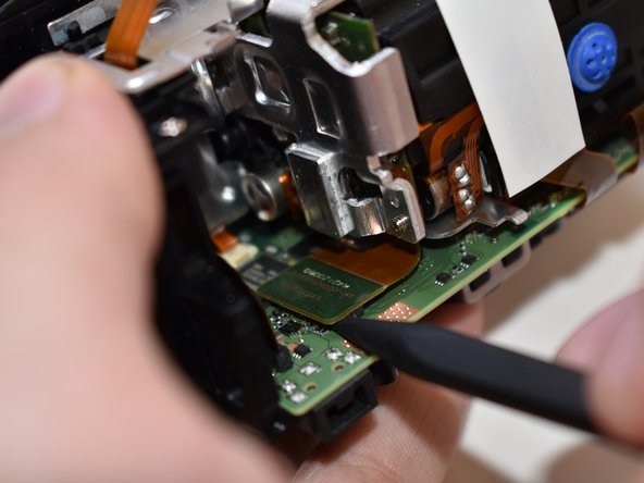 Canon Vixia HF R62 Display Panel Replacement, Central Capturing Unit: crwdns2935265:020crwdnd2935265:02crwdnd2935265:03crwdne2935265:0