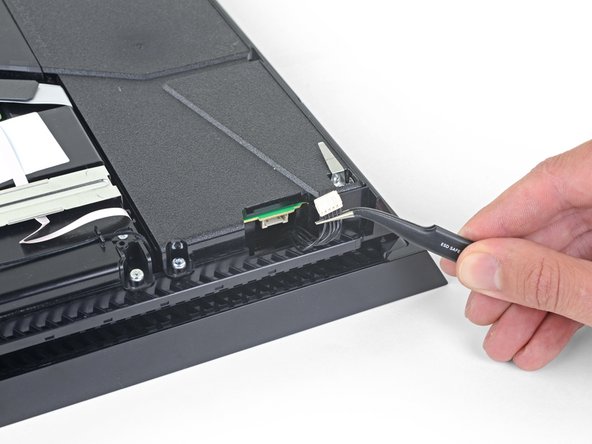 How to Open and Clean a PlayStation 4, Disconnect the power supply: crwdns2935265:05crwdnd2935265:02crwdnd2935265:02crwdne2935265:0