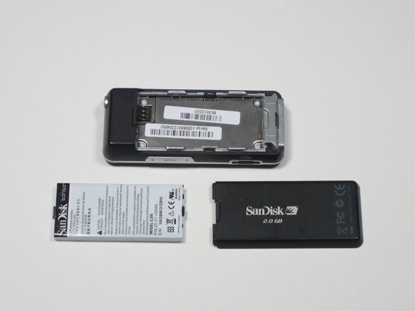 SanDisk Sansa C250 Rear Case Cover Replacement: crwdns2935265:03crwdnd2935265:02crwdnd2935265:02crwdne2935265:0