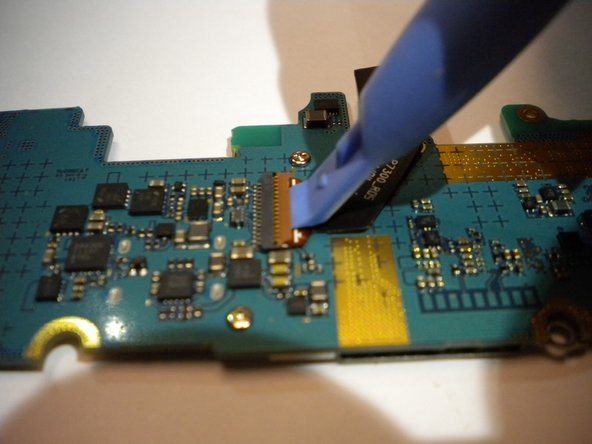 Samsung Galaxy Tab 8.9 Rear Facing Camera Replacement, Disconnect Flex Ribbon: crwdns2935265:011crwdnd2935265:02crwdnd2935265:03crwdne2935265:0