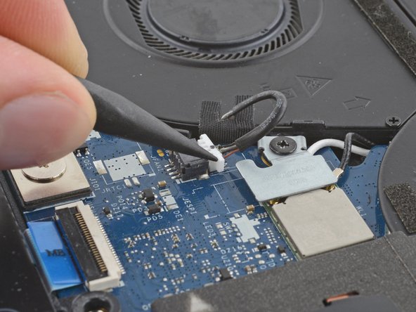 Dell Latitude 7410 Fan Replacement, Disconnect the fan: crwdns2935265:010crwdnd2935265:02crwdnd2935265:03crwdne2935265:0