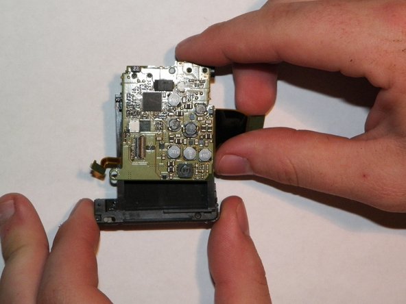 Canon PowerShot SD 600 Rear Accessory Board and Battery Compartment Replacement, Rear Accessory Board and Battery Compartment: crwdns2935265:028crwdnd2935265:02crwdnd2935265:03crwdne2935265:0