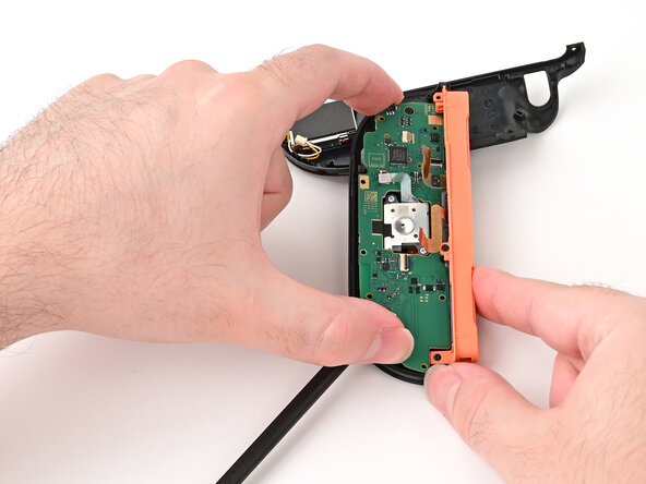Joy-Con 2 (Right) Joystick Replacement, Remove the board: crwdns2935265:025crwdnd2935265:01crwdnd2935265:03crwdne2935265:0