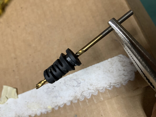 Power Brick Cord Repair, Push DC Cord Through Stress-Relief Collar: crwdns2935265:04crwdnd2935265:02crwdnd2935265:03crwdne2935265:0