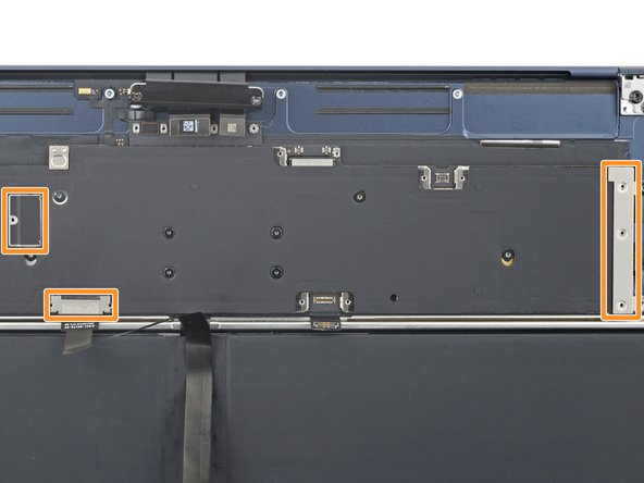 MacBook Air 15" 2023 Battery Replacement, Remove the connector covers: crwdns2935265:034crwdnd2935265:02crwdnd2935265:03crwdne2935265:0