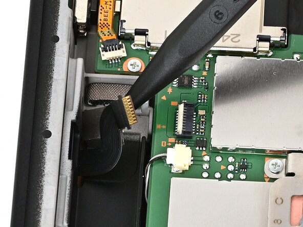 Nintendo Switch 2 Right Joy-Con 2 Connector Replacement, Lift the cable: crwdns2935265:038crwdnd2935265:02crwdnd2935265:03crwdne2935265:0