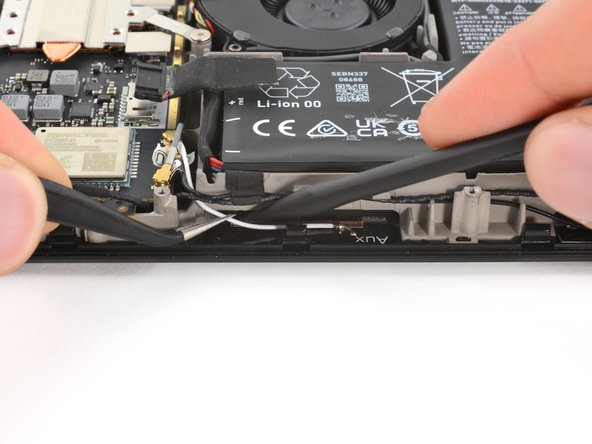 Steam Deck OLED Battery Replacement, Reposition the antenna cables: crwdns2935265:017crwdnd2935265:03crwdnd2935265:03crwdne2935265:0