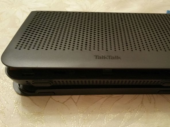 Serial Port and JTAG ports on a TalkTalk WiFi Hub, Releasing the Top Clips: step 2, image 2 of 3