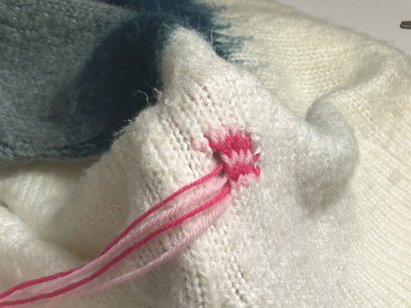 Using Needlework and Crochet to Patch a Hole in Knitwear: step 11, image 3 of 3