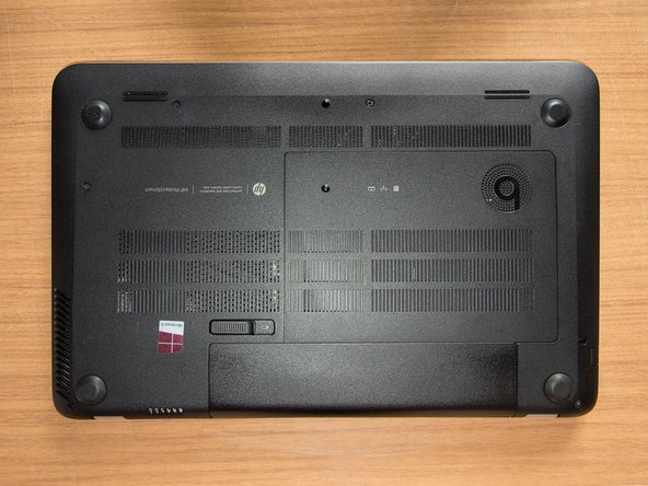 Install an mSATA SSD for the OS and keep the HDD as storage, Reassemble the service door and the battery: step 7, image 1 of 1