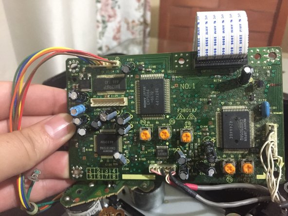 SNK Neo Geo CD Teardown, step 14: crwdns2935265:014crwdnd2935265:03crwdnd2935265:03crwdne2935265:0