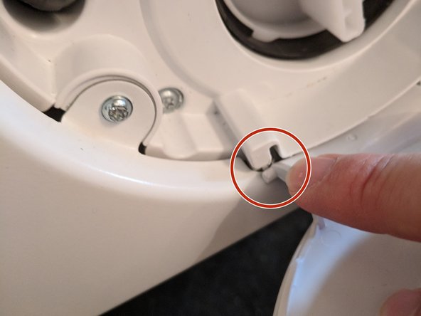 Washing Machine Disassembly to Access Water Drain Pump, Remove drain/filter door, drain water, and unscrew: step 8, image 1 of 2