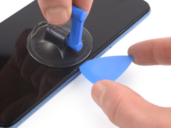 Xiaomi Mi 11 Lite Screen Replacement, Insert an opening pick: crwdns2935265:017crwdnd2935265:02crwdnd2935265:02crwdne2935265:0