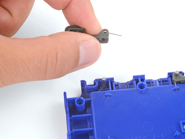 How to Install Shoulder Buttons in Your Game Boy Advance SP, Put the shoulder button in place: crwdns2935265:03crwdnd2935265:01crwdnd2935265:03crwdne2935265:0