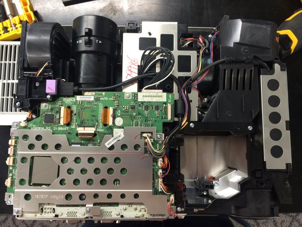 Epson Powerlite 915W Projector Lamp Ballast Replacement, Remove the Ribbon Cable: crwdns2935265:04crwdnd2935265:02crwdnd2935265:02crwdne2935265:0