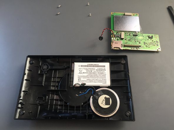 Garmin Nuvi 2529 Disassembly, Removing the logic board from back cover: crwdns2935265:06crwdnd2935265:02crwdnd2935265:02crwdne2935265:0