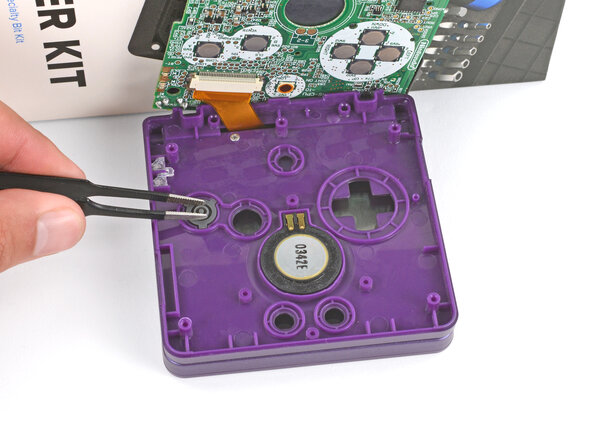 How to Reshell Your Game Boy Advance SP, Install the buttons and silicone pads: crwdns2935265:057crwdnd2935265:01crwdnd2935265:03crwdne2935265:0