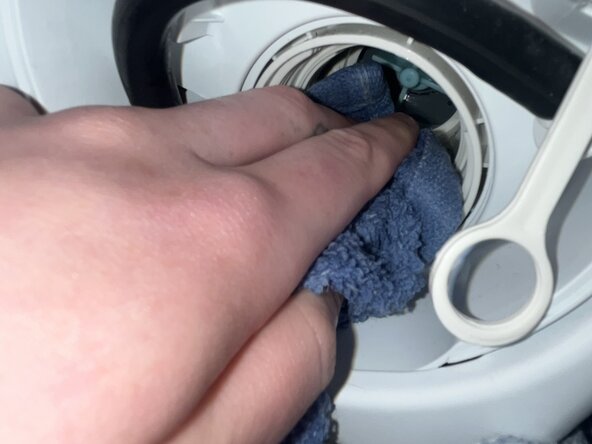 How to Clean the Filter of a GE 24" Front-Loading Washing Machine: step 6, image 2 of 2