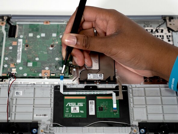 Asus L406M Touchpad Replacement, Touchpad: step 7, image 1 of 2