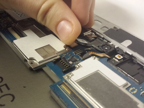 Samsung Galaxy Note 10.1 LCD Replacement, Removing the Components Around the Motherboard: crwdns2935265:05crwdnd2935265:03crwdnd2935265:03crwdne2935265:0