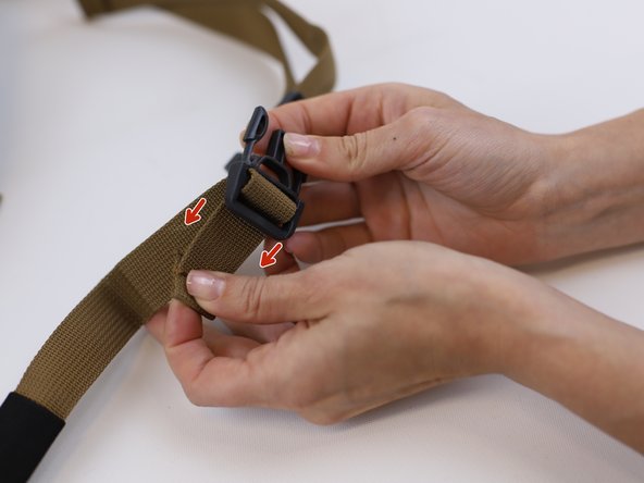 How to Replace a Backpack Buckle (without sewing), Insert the new buckle: crwdns2935265:03crwdnd2935265:03crwdnd2935265:03crwdne2935265:0