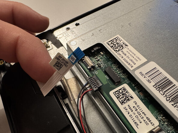 Dell Inspiron 20 3043 CMOS Battery Replacement, Remove the speaker cable and power status light cable: step 10, image 3 of 3