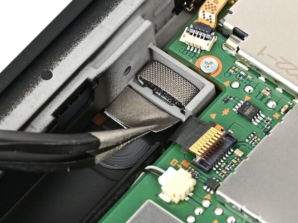 Nintendo Switch 2 Right Joy-Con 2 Connector Replacement, Install the silver sticker: crwdns2935265:044crwdnd2935265:02crwdnd2935265:02crwdne2935265:0
