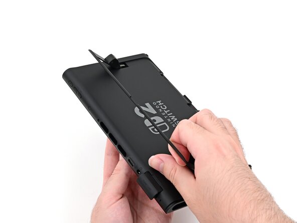 Nintendo Switch 2 Microphone Replacement, Install the back cover: crwdns2935265:052crwdnd2935265:02crwdnd2935265:03crwdne2935265:0