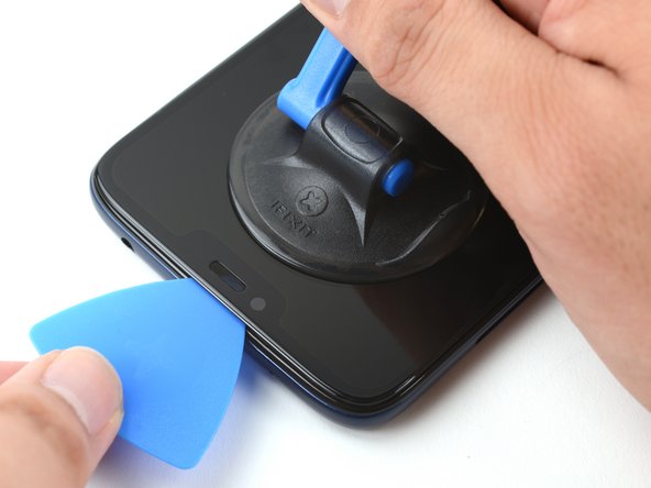 Depending on the age of your device, this may be difficult. If you have trouble, apply more heat and try again.