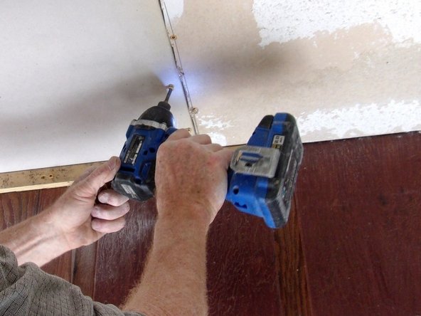 Attach the new piece to the rafters on each side, placing the screws a little back from the edge as before and angled slightly into the rafter.  Pic 2.