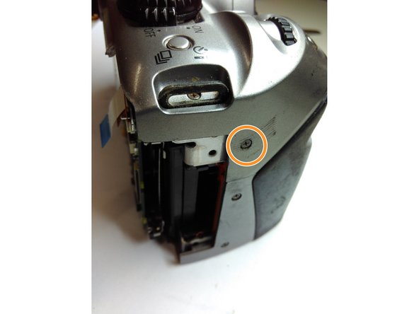 Canon EOS Digital Rebel (300D) Top Casing Replacement, Remove screws from the top casing: step 10, image 2 of 3