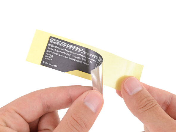 How to Reshell Your Game Boy Advance SP, Apply new stickers: crwdns2935265:069crwdnd2935265:01crwdnd2935265:03crwdne2935265:0