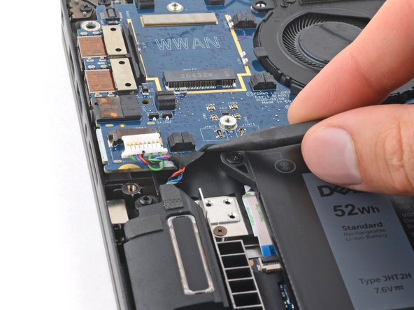 Dell Latitude 7410 I/O Board Replacement, Pry up the I/O board: crwdns2935265:018crwdnd2935265:02crwdnd2935265:02crwdne2935265:0