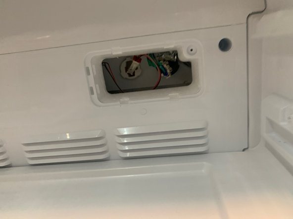 Frigidaire Refrigerator Ice Maker Manual Defrost -  MDR-22 ( FG4H2272UF), Bonus Back Panel Removal: step 5, image 1 of 2