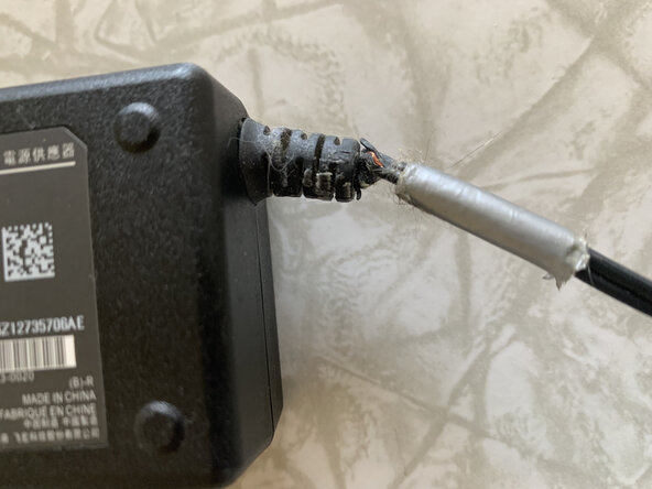 Power Brick Cord Repair, Reassemble the Power Brick: crwdns2935265:06crwdnd2935265:03crwdnd2935265:03crwdne2935265:0