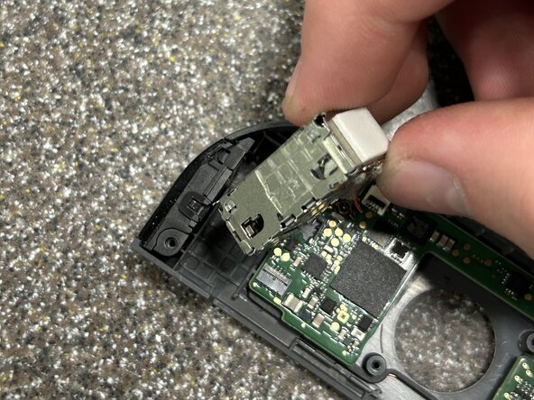 Right Joy-Con Teardown: crwdns2935265:023crwdnd2935265:02crwdnd2935265:03crwdne2935265:0