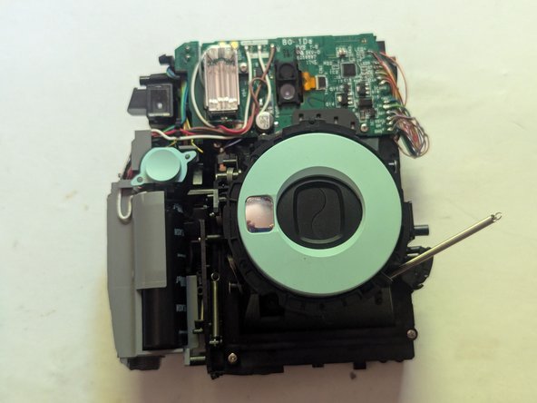 Fujifilm Instax Mini 9 Camera Shell Replacement, Remove the Front Cover: crwdns2935265:014crwdnd2935265:03crwdnd2935265:03crwdne2935265:0