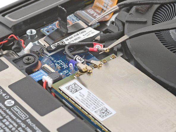 HP EliteBook 845 G9 WWAN Module Replacement, Disconnect the WWAN module: crwdns2935265:08crwdnd2935265:03crwdnd2935265:03crwdne2935265:0