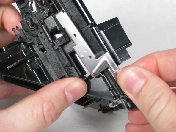 Remove the film eject metal slide