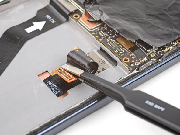 Motorola Edge (2022) Display Replacement, Separate the cable adhesive: crwdns2935265:041crwdnd2935265:03crwdnd2935265:03crwdne2935265:0