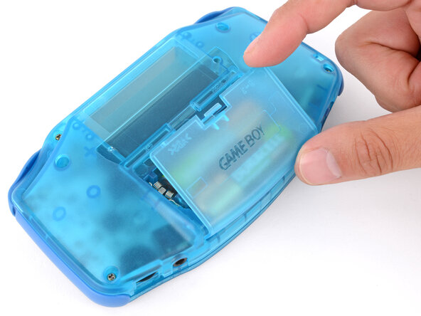 How to Reshell Your Game Boy Advance, Install the battery cover: crwdns2935265:037crwdnd2935265:01crwdnd2935265:02crwdne2935265:0