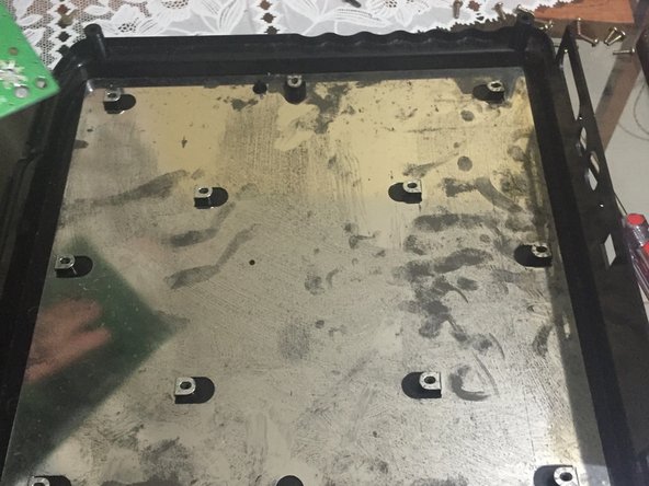 SNK Neo Geo CD Teardown, step 13: crwdns2935265:013crwdnd2935265:02crwdnd2935265:03crwdne2935265:0