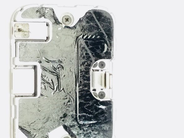 iPhone dock Teardown, Peeling back the black sticker: crwdns2935265:05crwdnd2935265:02crwdnd2935265:03crwdne2935265:0