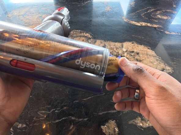 Dyson V15 Detect Head Brush Bar Replacement: step 4, image 1 of 3