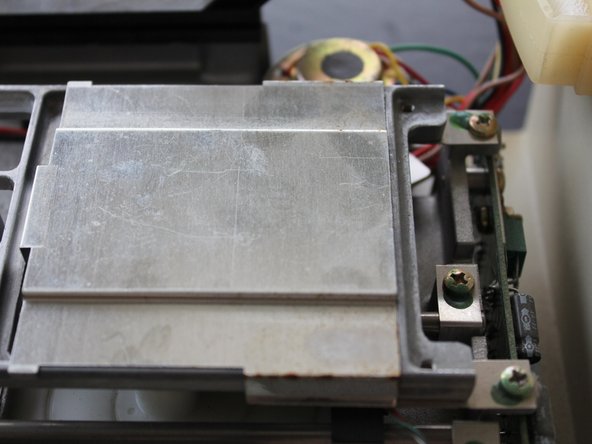 Apple Disk II Floppy Disk Subsystem Teardown and Optical Drive Conversion, Remove screws: step 11, image 2 of 3